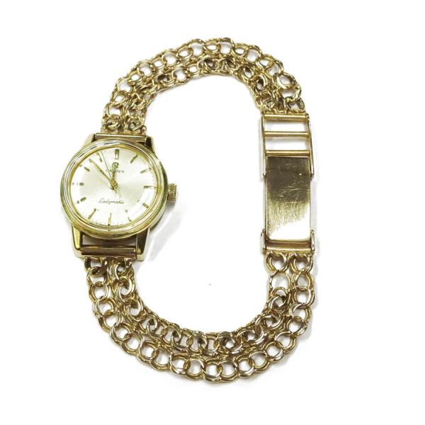 Kultainen Omega-kello Ladymatic bismarck-rannekkeella v.1956 #0