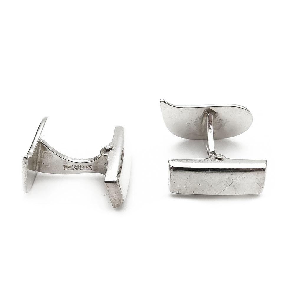 Hopeiset kalvosinnapit #1