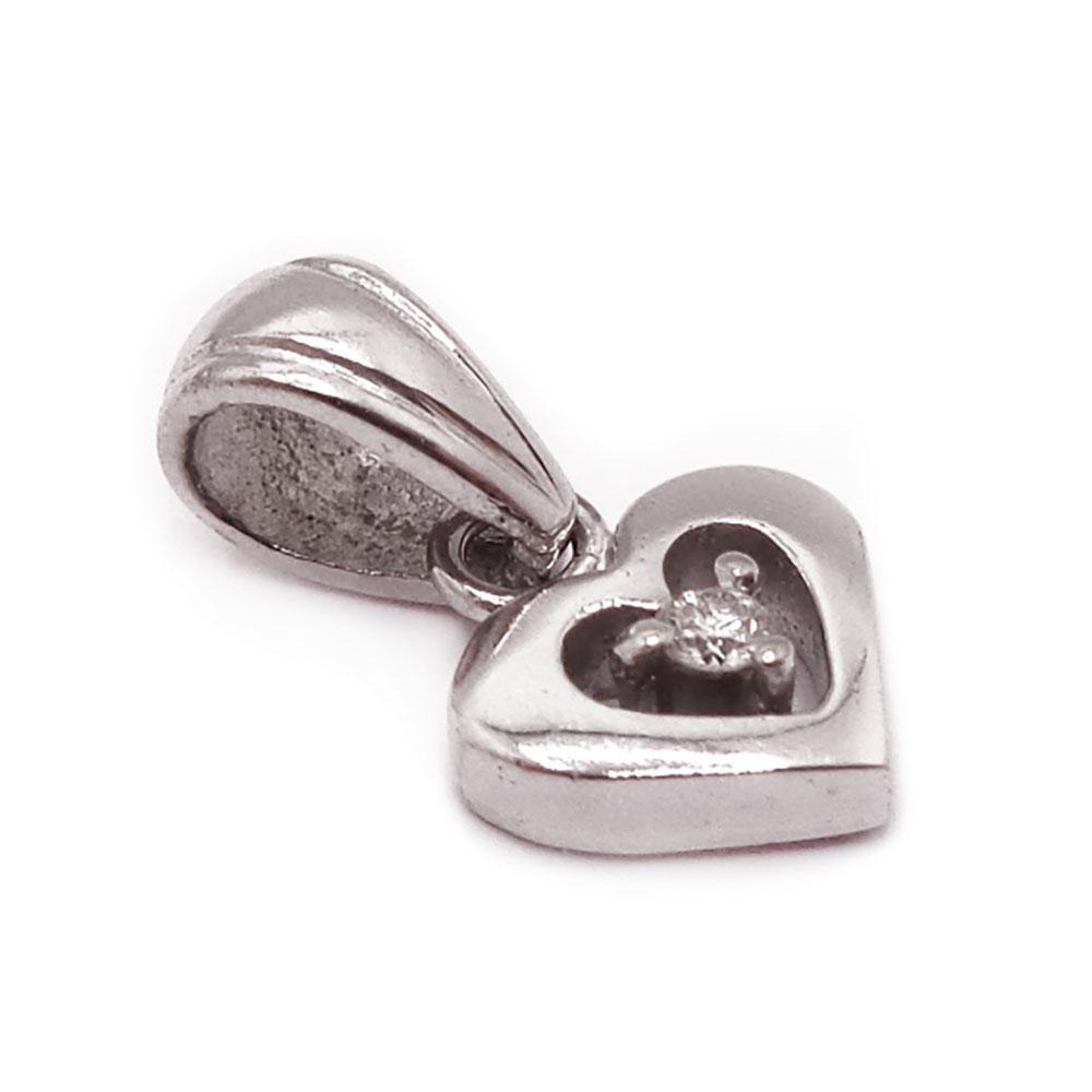 Valkokultainen sydänriipus tim.0,01ct v.-98 #1