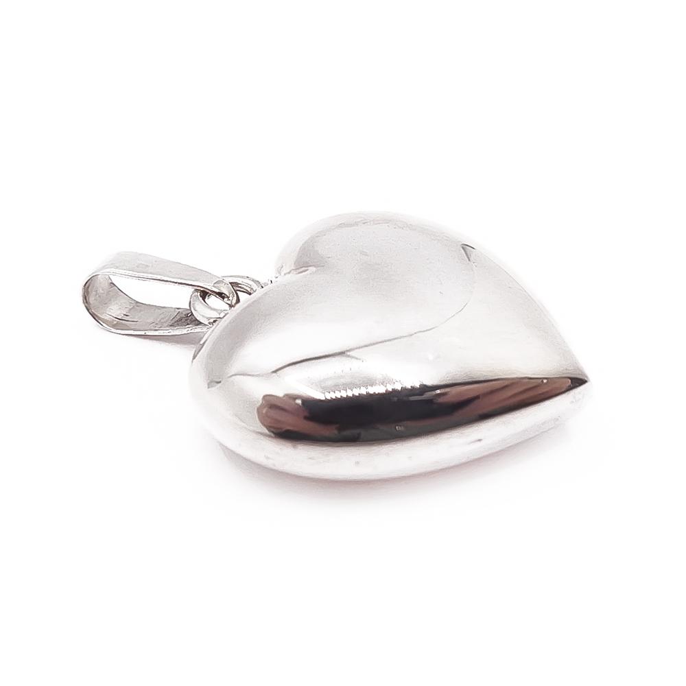 Hopeinen pullea sydän #1