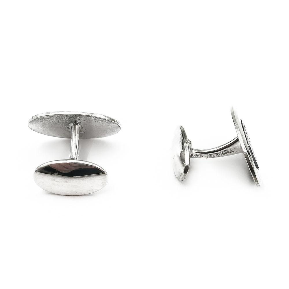 Uusi Suomi kalvosinnapit v.-58 #1