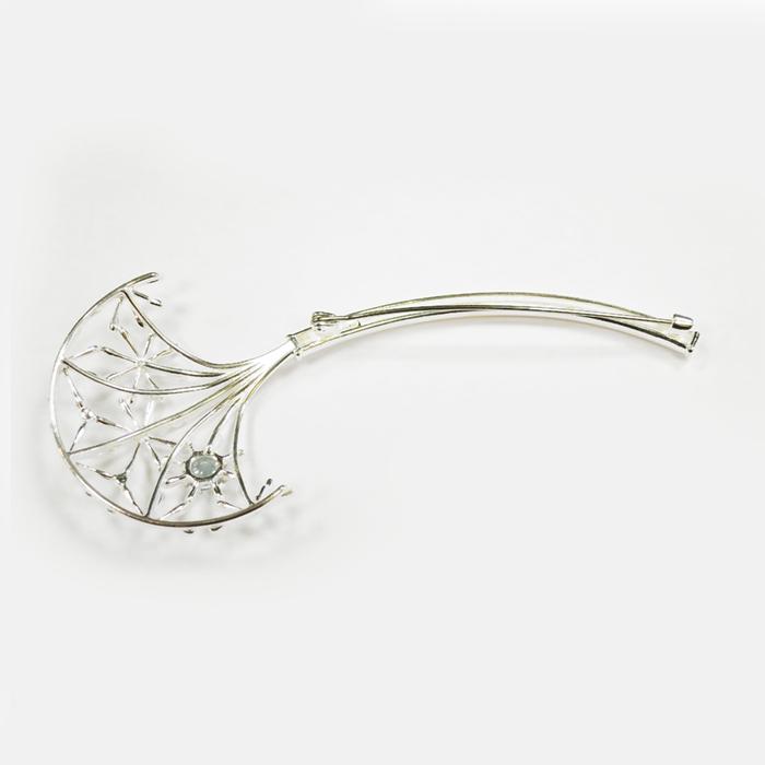 Kalevala koru Naisen ääni rintaneula topaasilla hopea #1