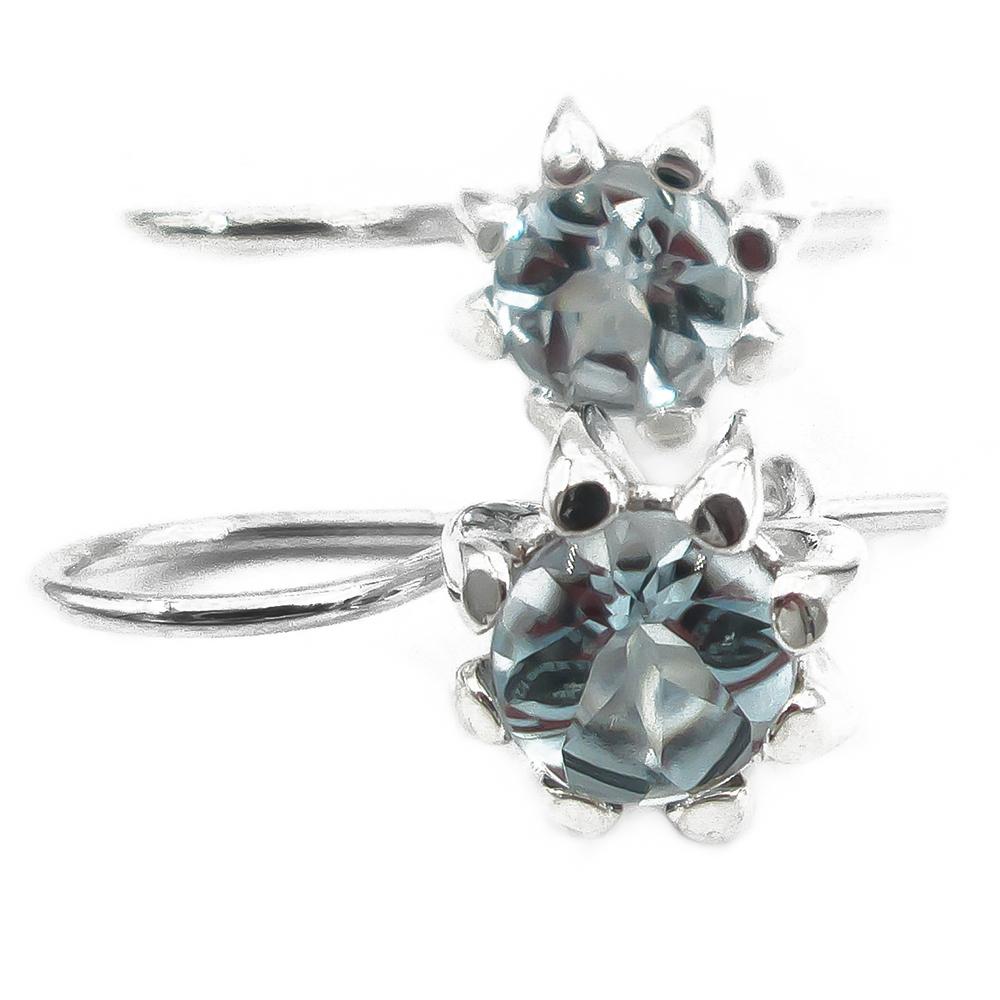 Kalevala koru Naisen ääni korvakorut topaasilla hopea #1