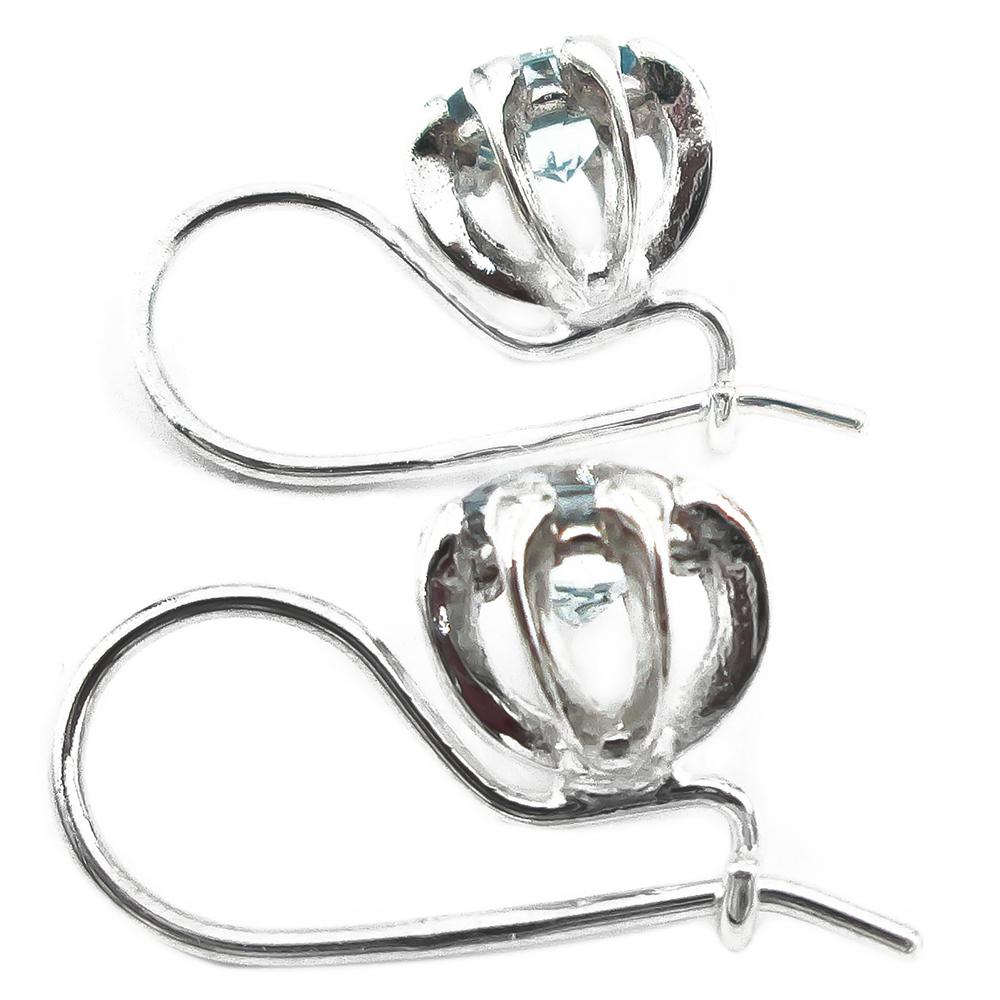 Kalevala koru Naisen ääni korvakorut topaasilla hopea #2