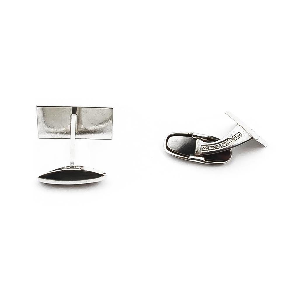 Hopeiset kalvosinnapit #1