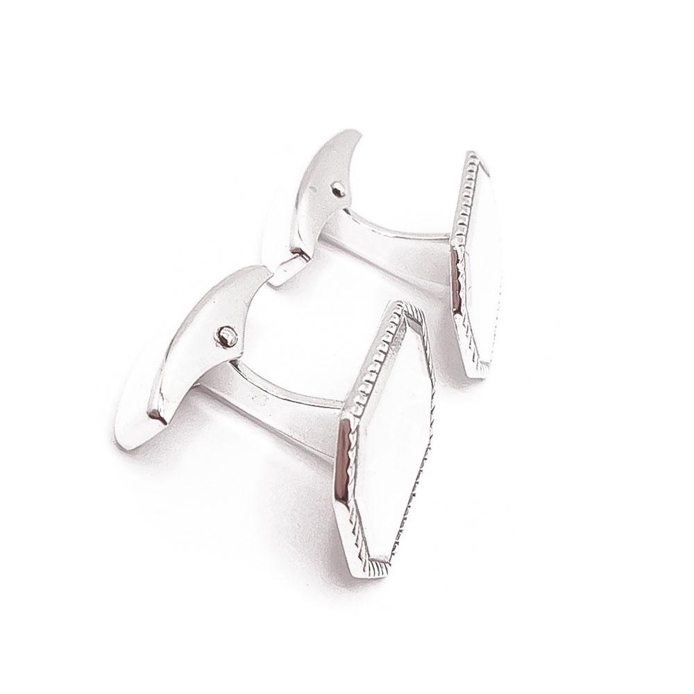 Hopeiset kalvosinnapit #1