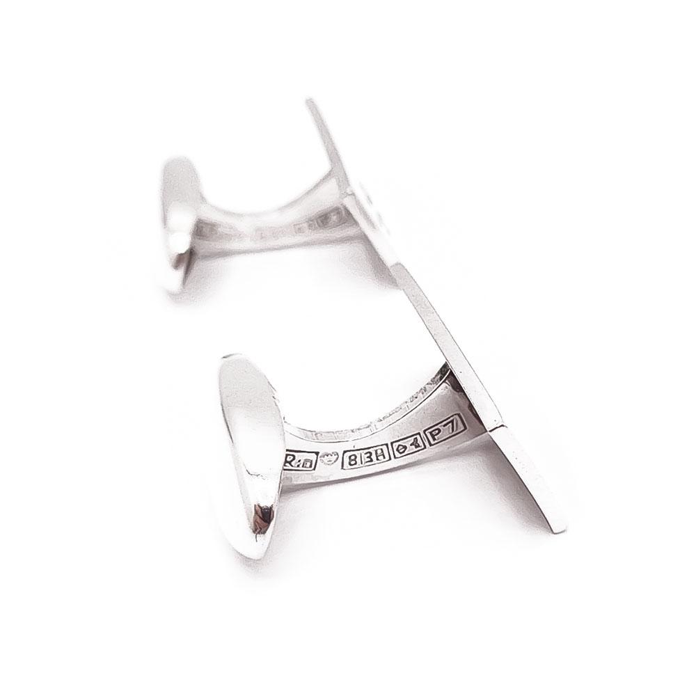 Hopeiset kalvosinnapit v.-68 #1