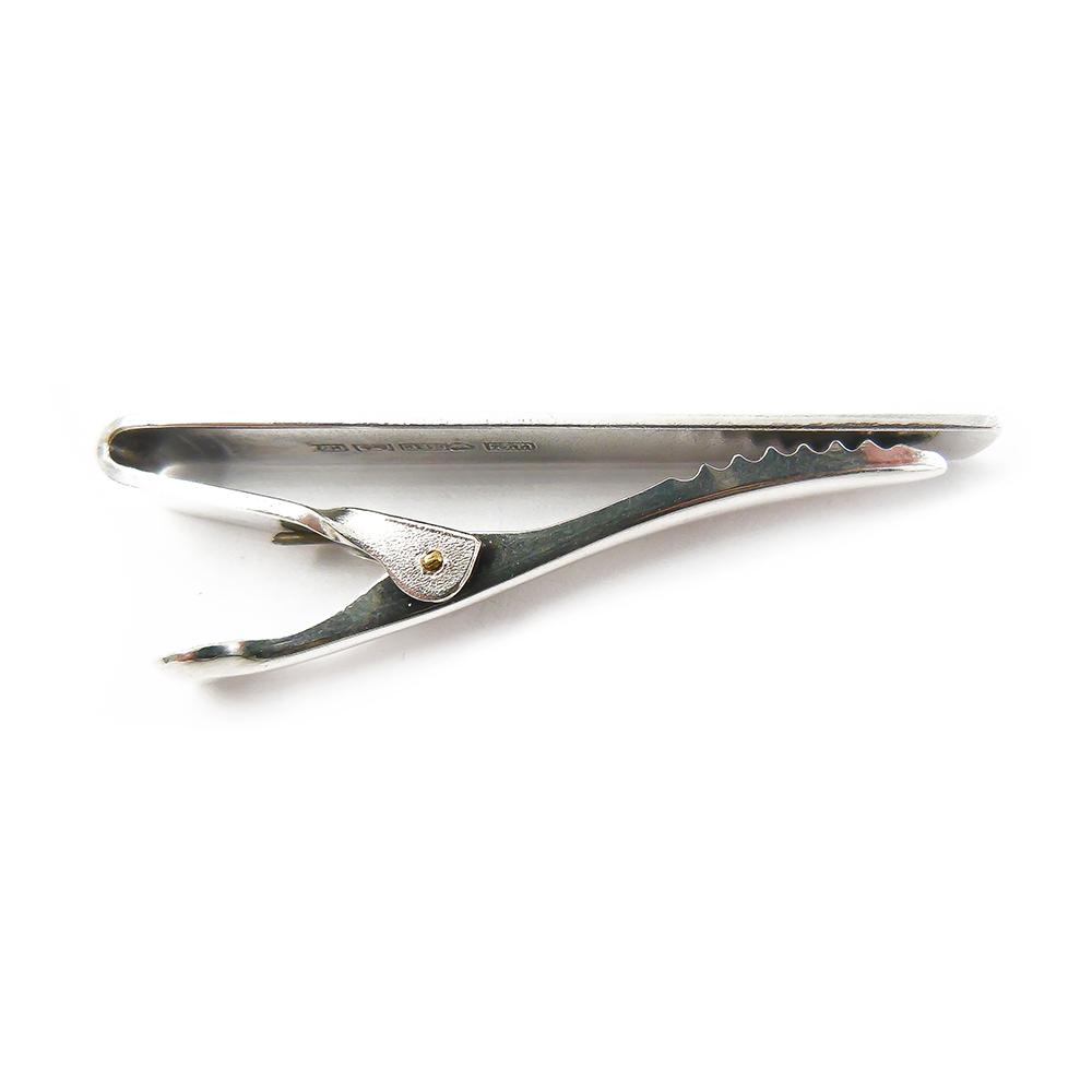 Hopeinen solmioneula #2