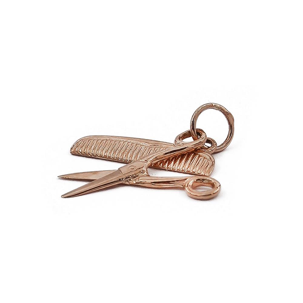 Kultainen parturikampaajan sakset ja kampariipus #1