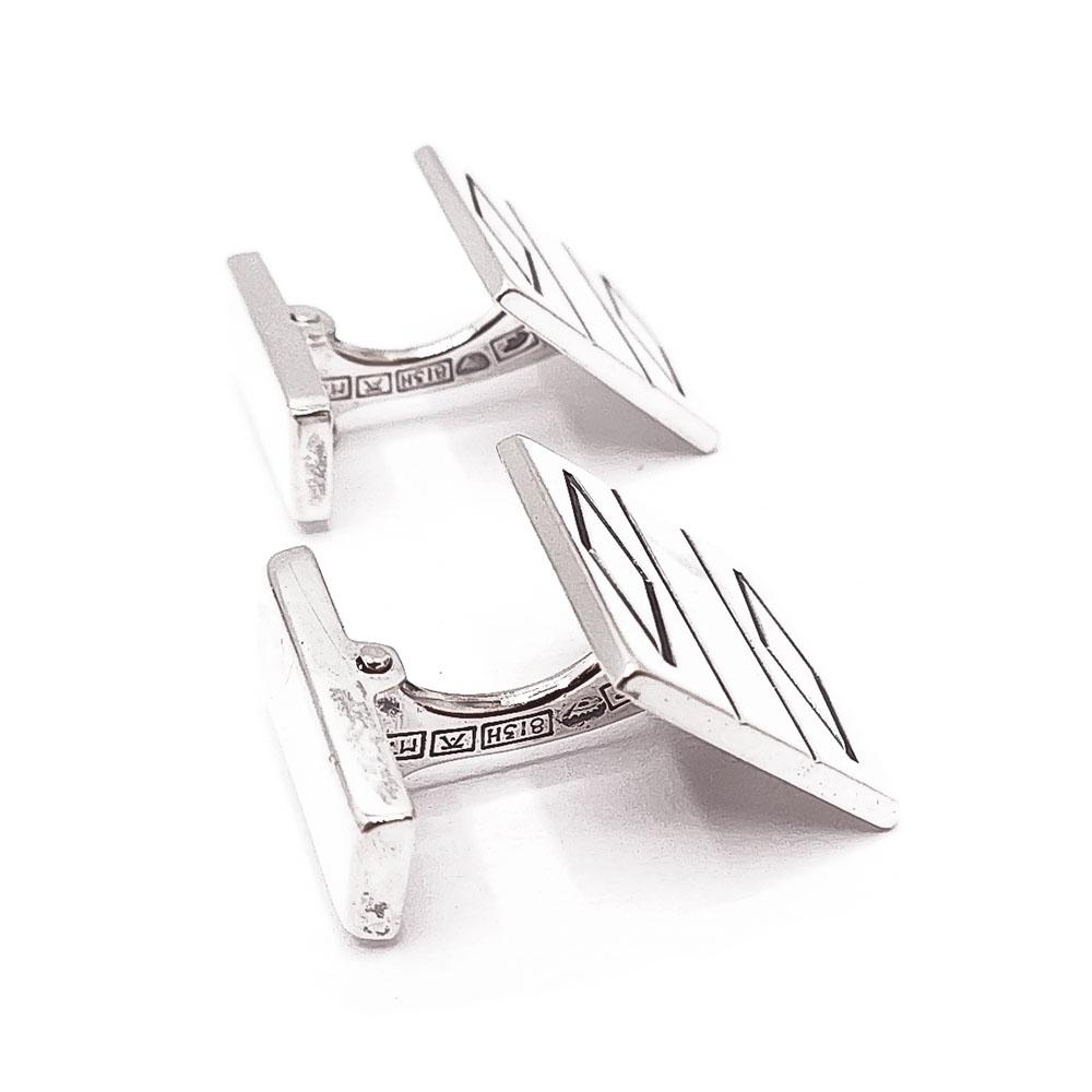 Hopeiset kalvosinnapit v.-65 #1