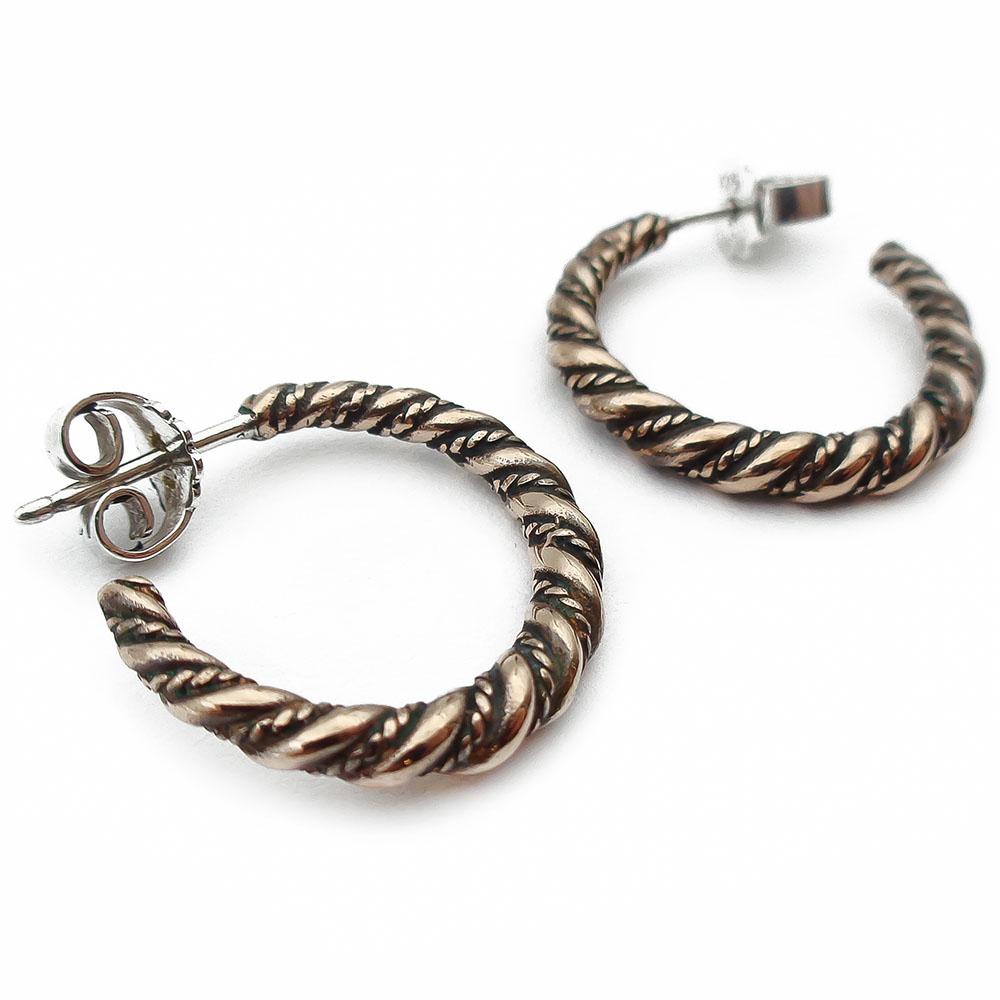 Kalevala Koru Halikon lampolan kierrekorvak. pronssi #1