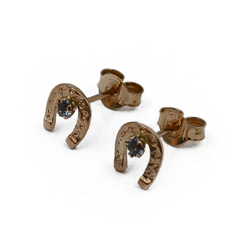 Kultaiset hevosenkenkä korvakorut vaaleansinisellä kivellä #0