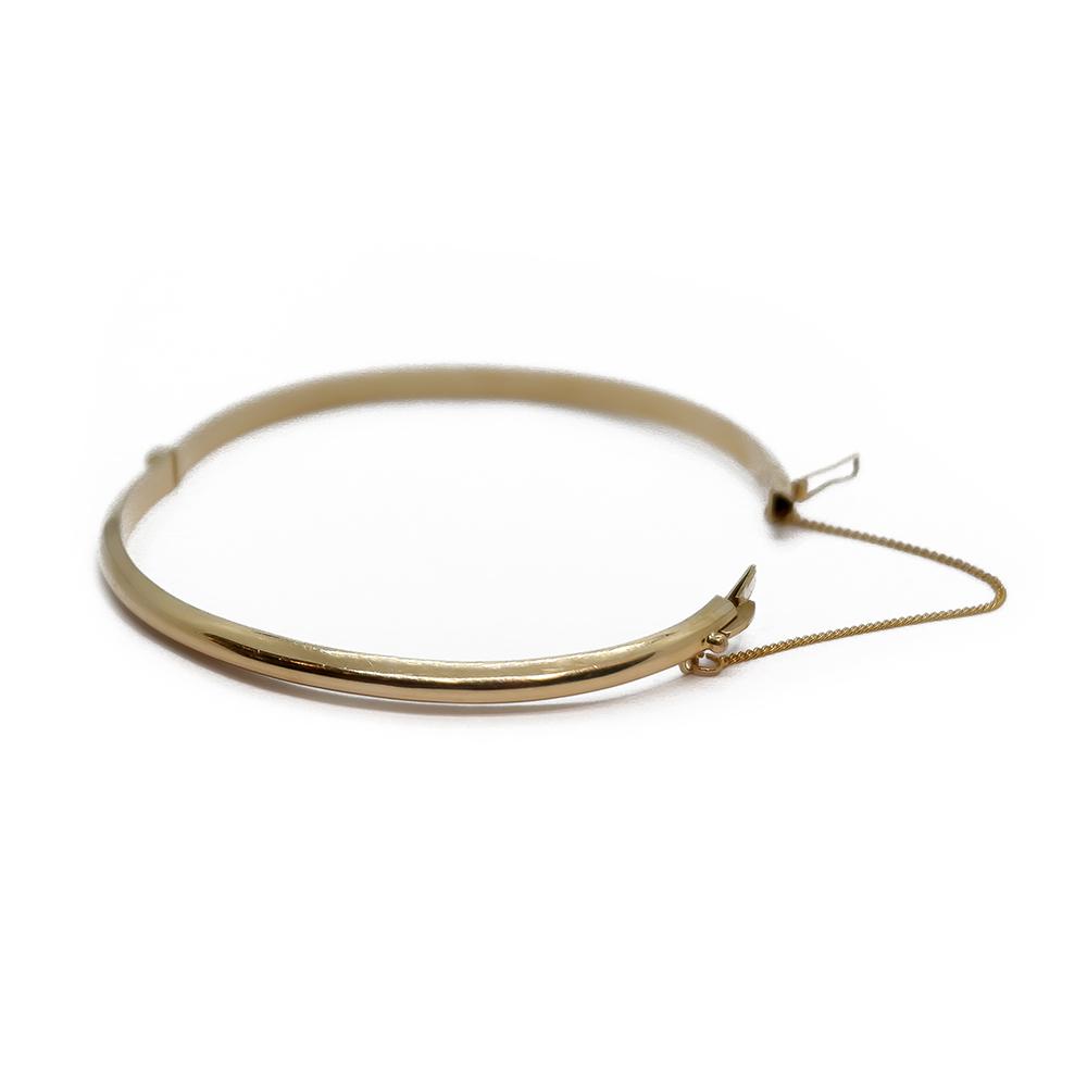 Esko Mustonen kultainen saranoitu rannerengas 14K, 50 × 57 mm, 1989 #1 Kultatukku.fi