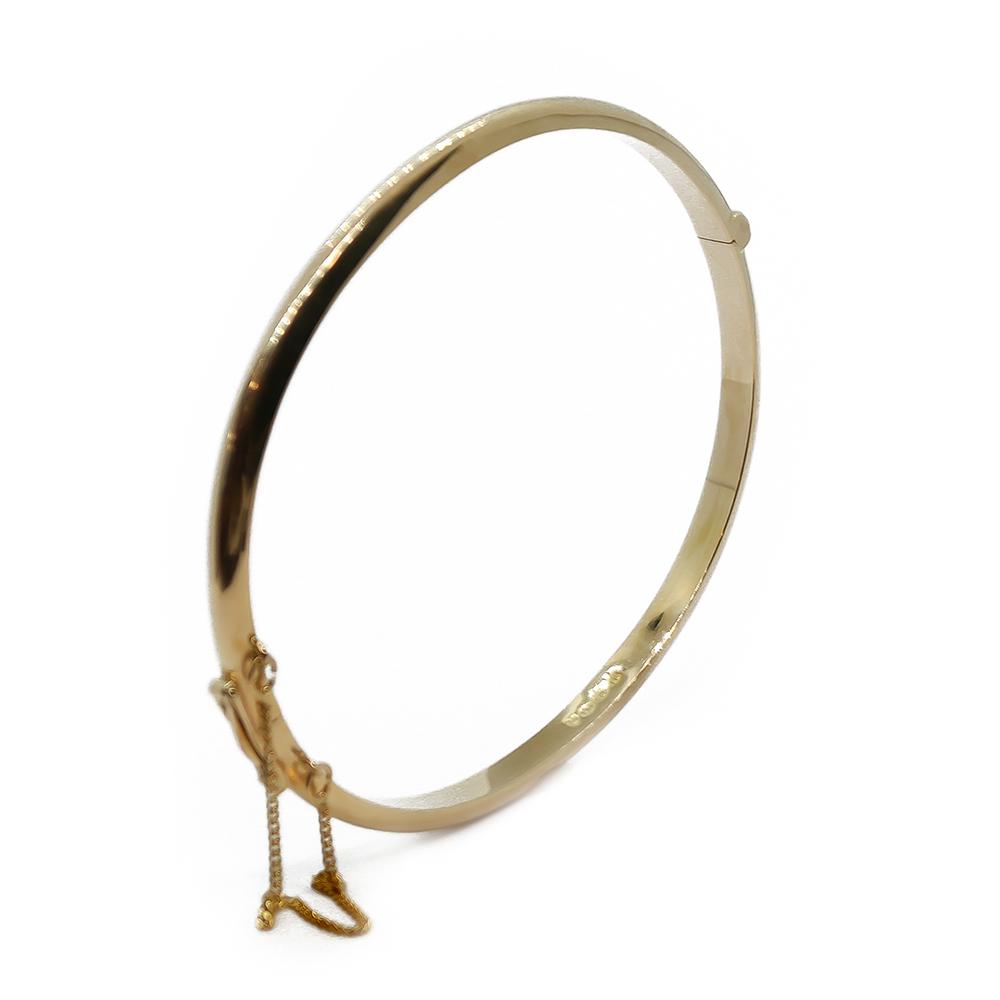 Esko Mustonen kultainen saranoitu rannerengas 14K, 50 × 57 mm, 1989 #2 Kultatukku.fi